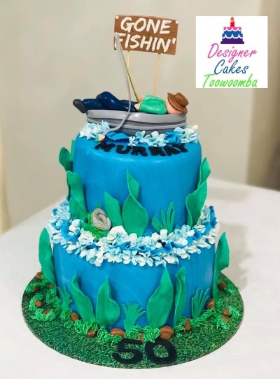Gone Fishing- cake with all Handmade icing decorations 1.jpg